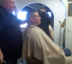 Brad gets a Texas flat-top hair cut